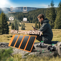 Man using 30W foldable solar charger outdoors charging phone and camera